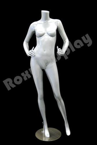 Female mannequin headless, with both hands on waist